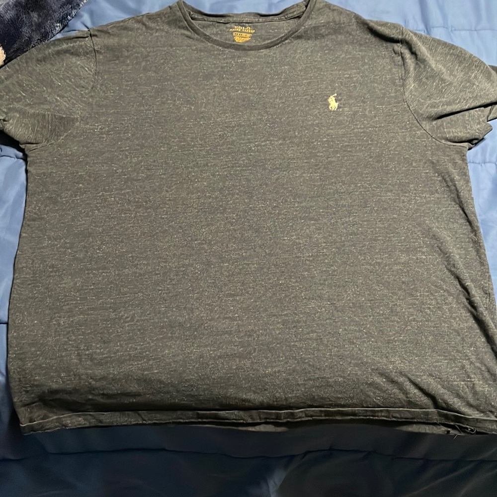 Large blue polo shirt.